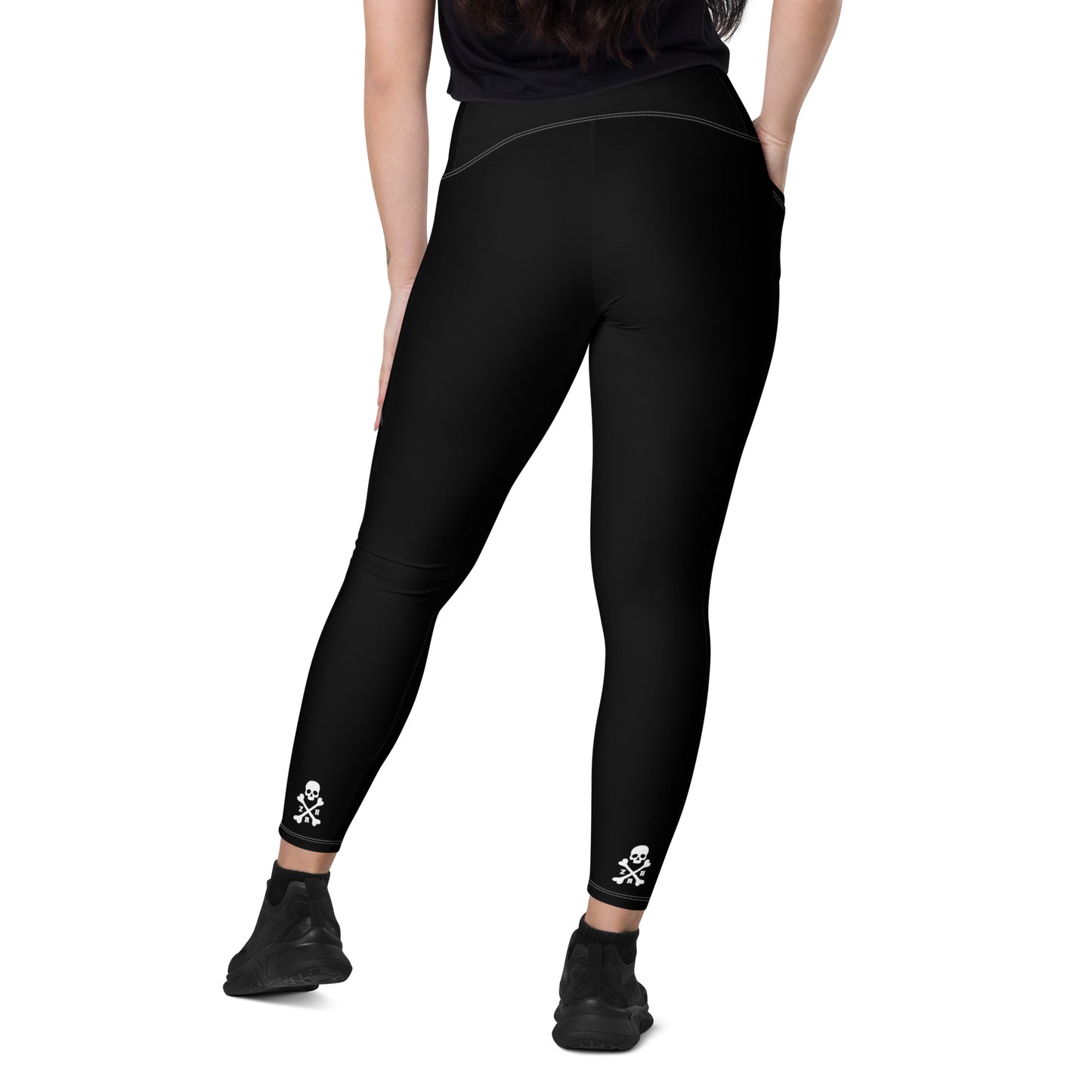 Schwarz-weiße Leggings mit Taschen